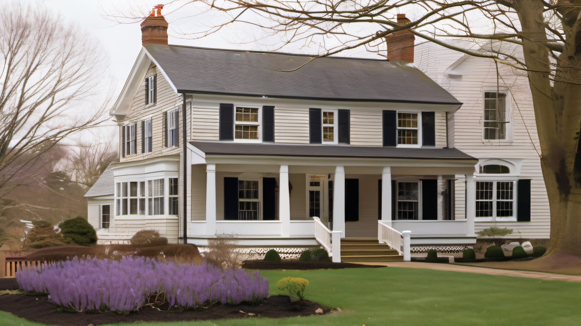 New England colonial home in early spring with last snow melting and first crocuses emerging, planning for exterior painting