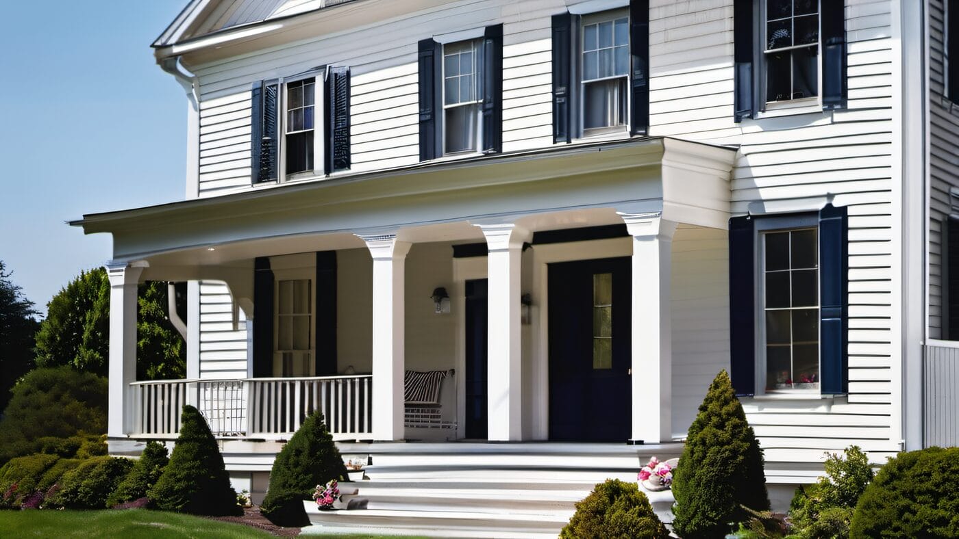 Close-up of freshly painted white exterior trim and navy shutters on a colonial home in Holliston MA, crisp clean lines